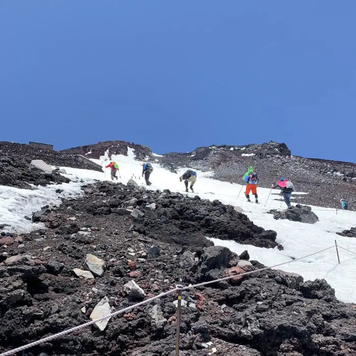 Climbing Mouont Fuji with snow